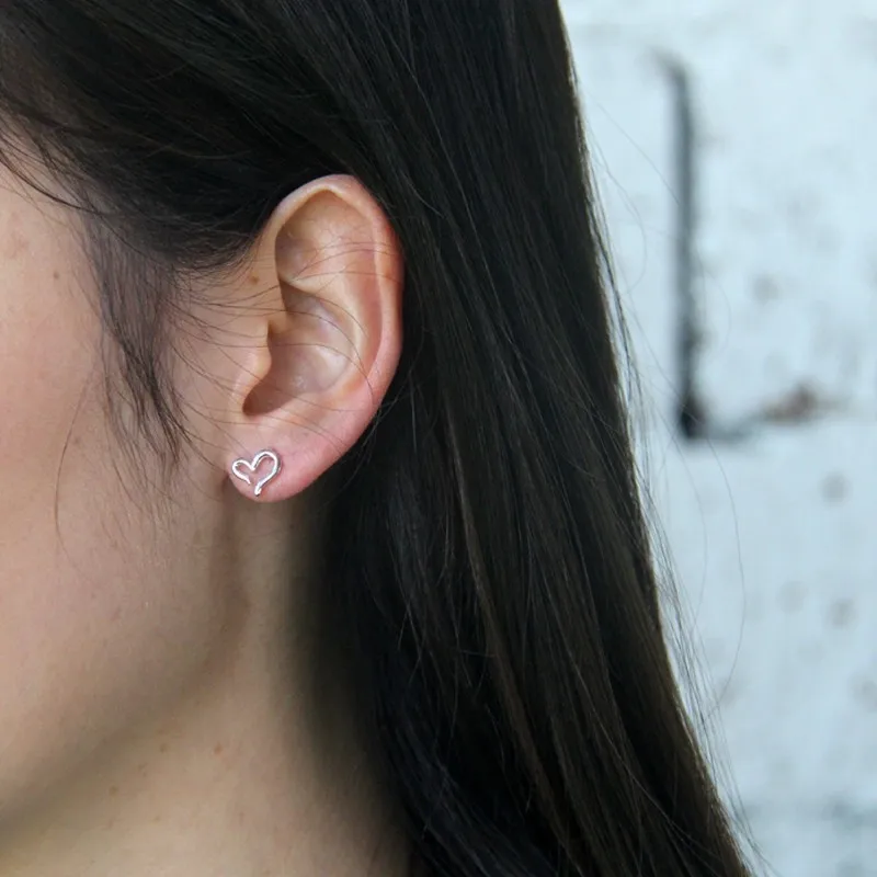 Heartfelt Elegance: Silver Color Heart-Shaped Stud Earrings for Women - A Timeless Symbol of Love and Style