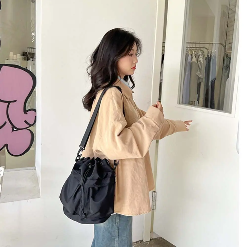 

Korean Style Swimming Nylon Crossbody Bag Large Capacity Nylon Drawstring Fitness Bag Niche Design Solid Color Bucket Bag