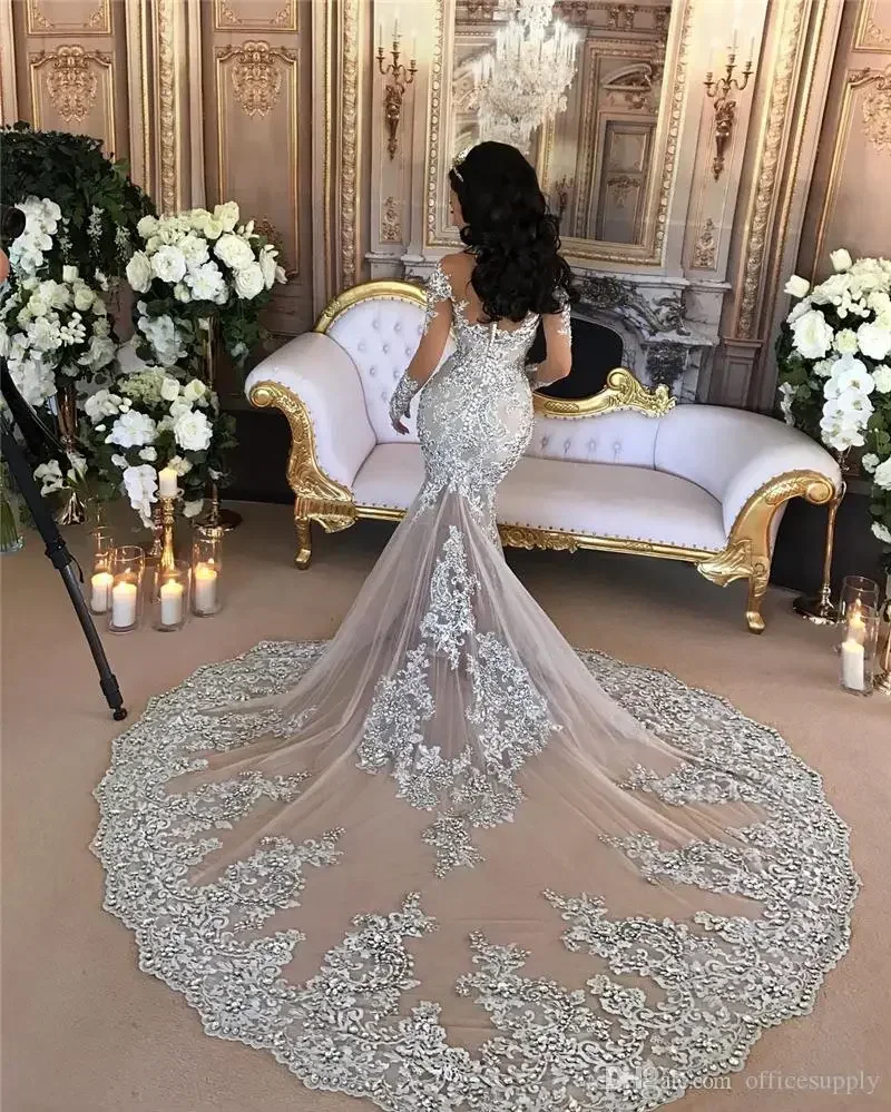 Abito da sposa a sirena personalizzato Perline scintillanti trasparenti sexy Applique in pizzo Collo alto Illusione Manica lunga Champagne Tromba da sposa Go