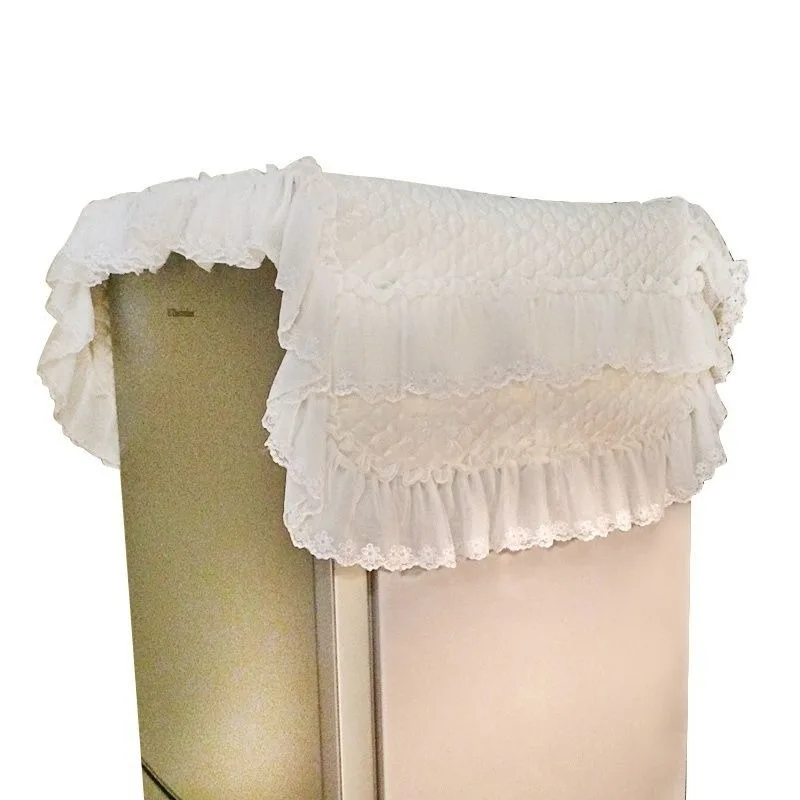 

Beautiful refrigerator with white lace edge dust cover