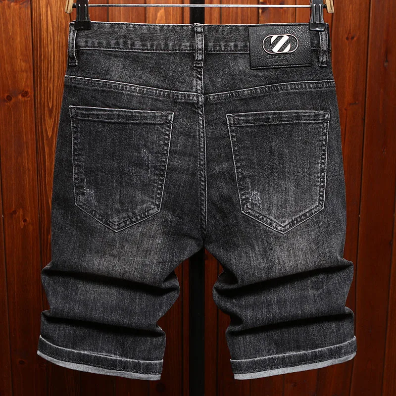 2025 summer thin denim shorts for men's fashion, light luxury printed design, elastic slimming trend, quarter pants