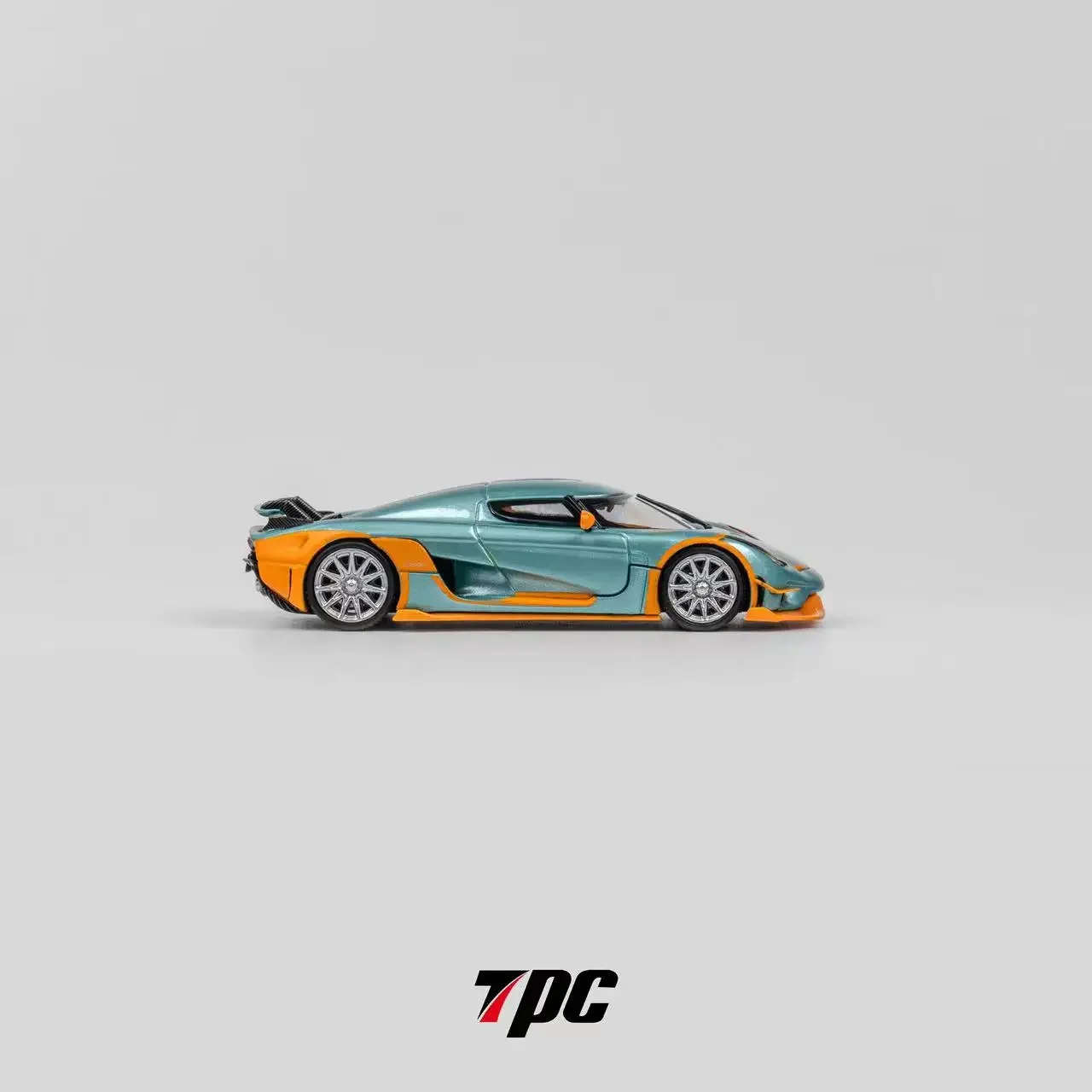 TPC 1:64 Regera Iceblue mit orangefarbenem Lackiermodellauto