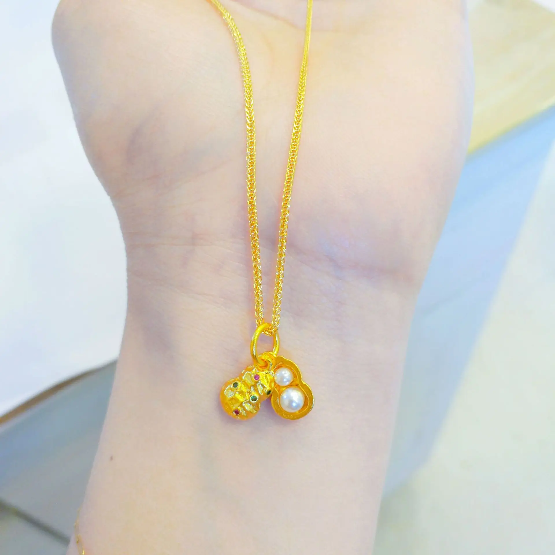 

AU999 24K Gold Peanut Pendant | Matte peanuts with pearls, cloud - engraved shells, enamel bow, stylish & classic