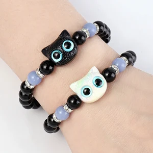 1 PC Pulseras a juego Parejas Mujeres Luminoso Lindo Cat Amistad Bracelete Negro Blanco Cabeza de gato Bead Strand Pulsera 12 Bracelet de Bobinal de ventas de 12 ventas - №3