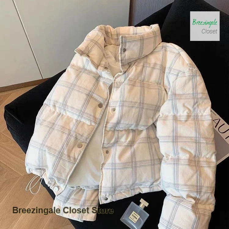 

Korean corduroy plaid collar thickened cotton-padded jacket women's autumn and winter new temperament warm casual coat.