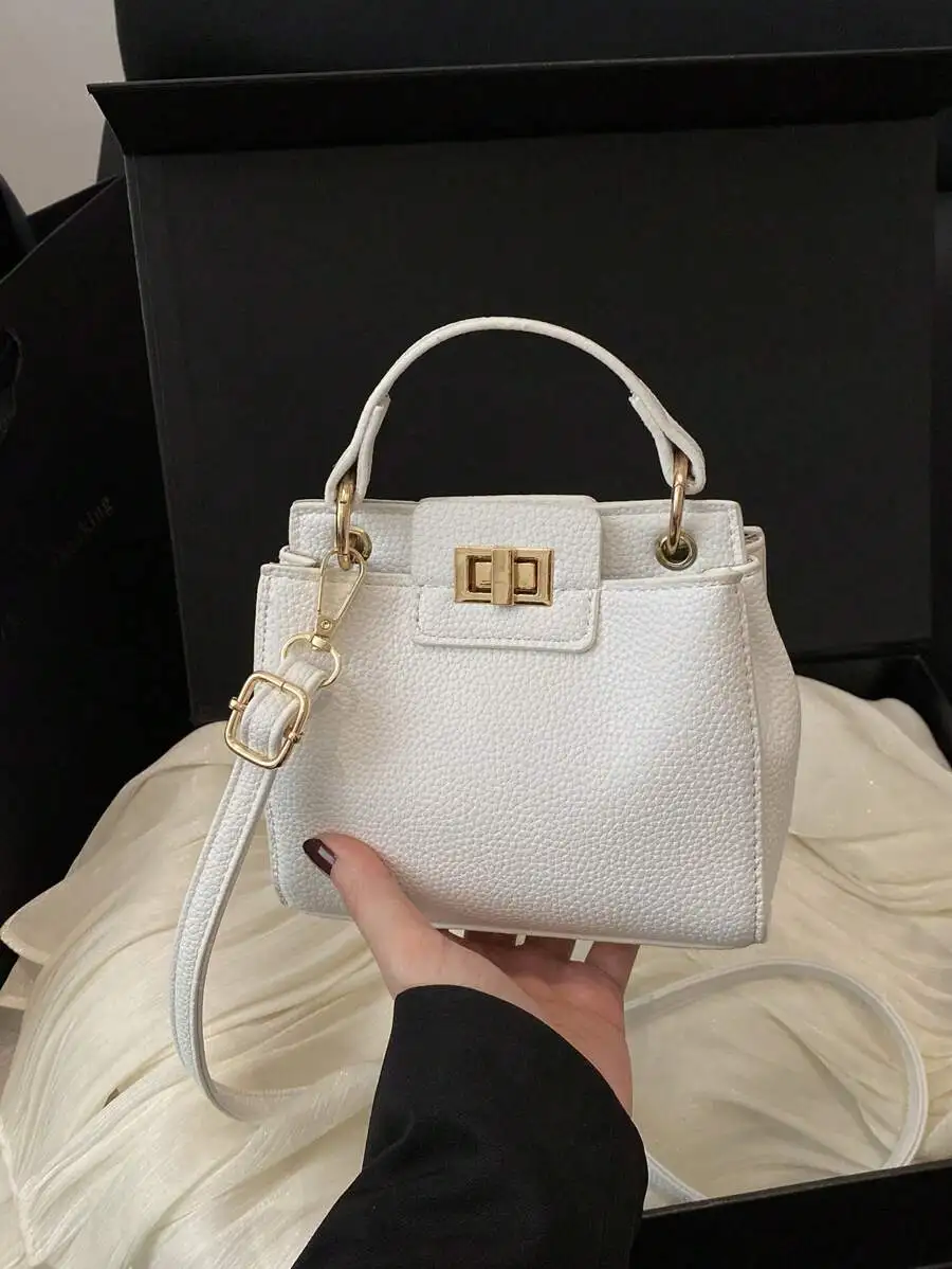 

White Textured Top-Handle Mini Bag with Gold Clasp and Adjustable Strap
