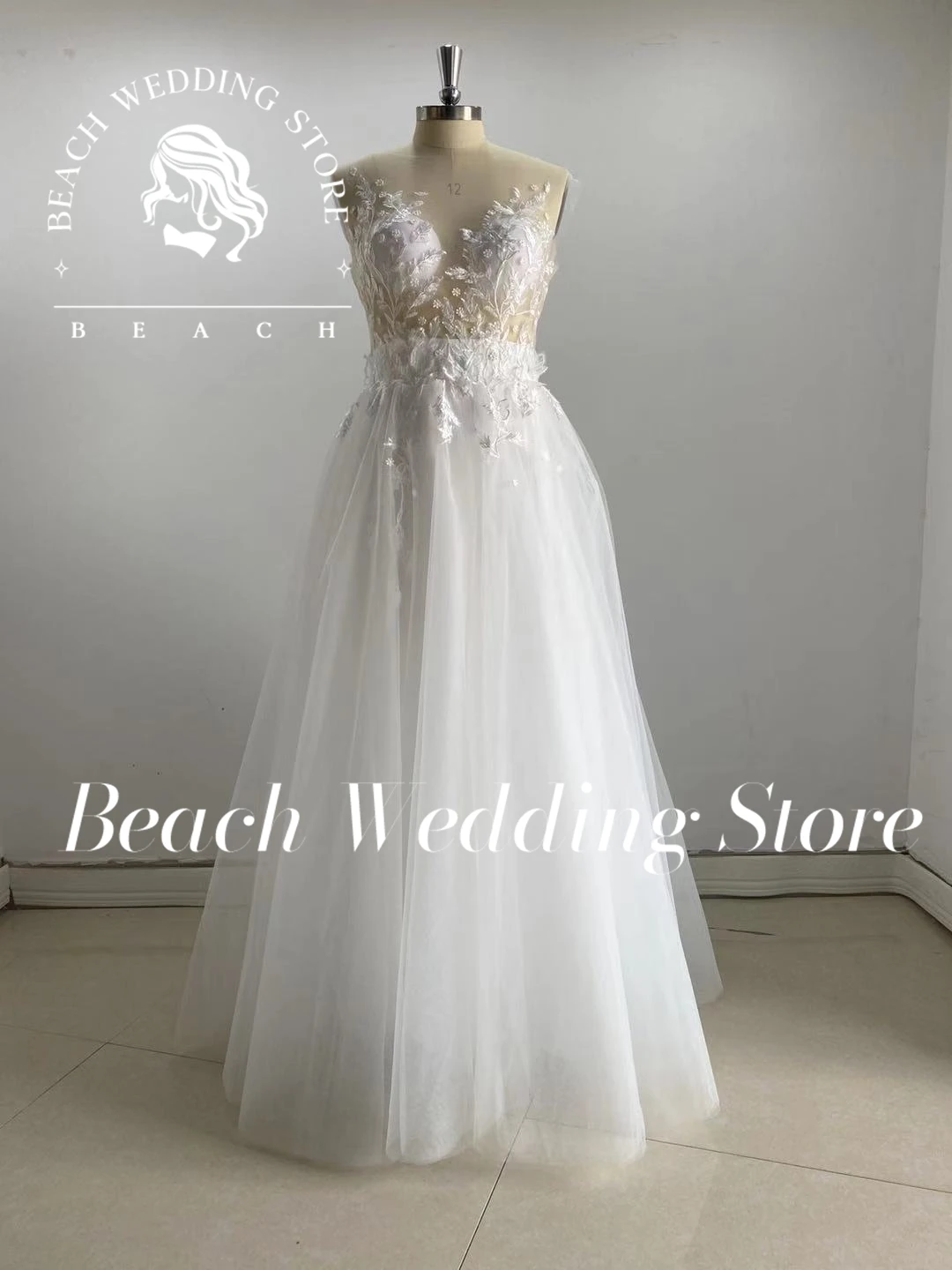 Abito da sposa da spiaggia fiori 2024 per donna a-line con scollo a v profondo Appliques senza maniche in Tulle senza schienale lunghezza del pavimento abiti da sposa