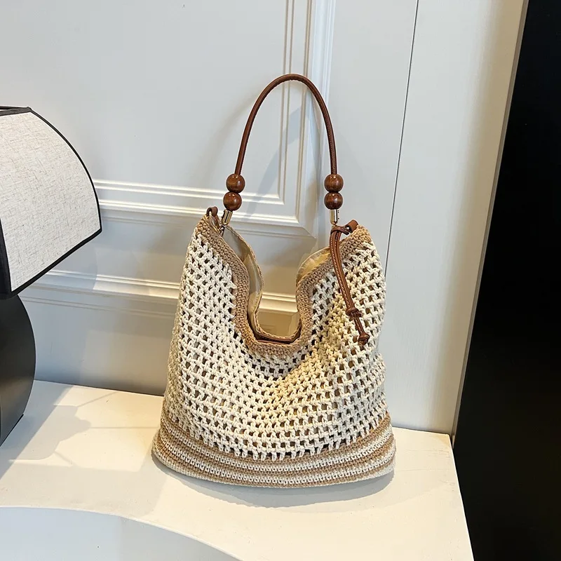 

Forest-Style Hollow-Out Seaside Resort-Style Woven Straw Women, New Beach Commuter Bucket Shoulder Bag For Women