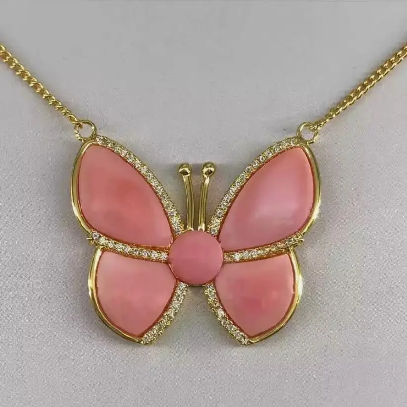 

gorgeous south sea natural pink conch pearl butterfly pendant 925s