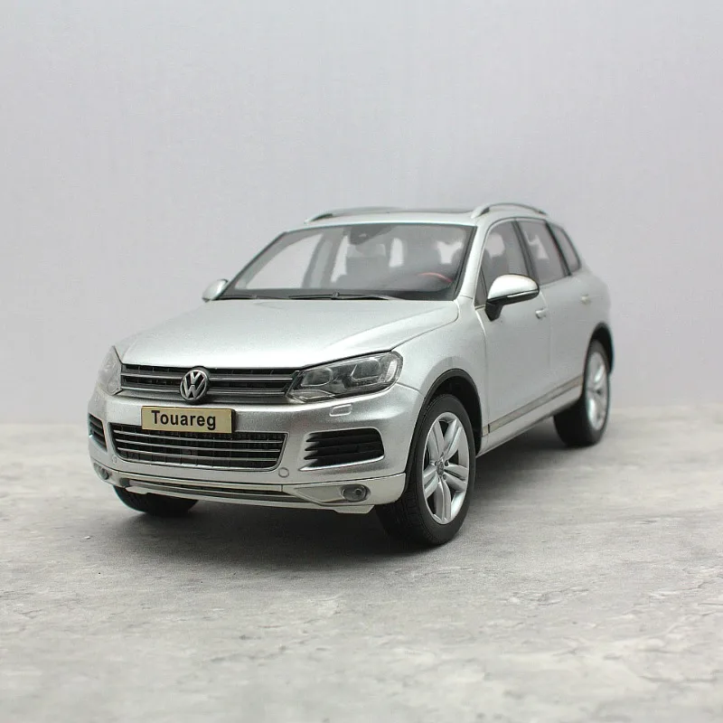 

In stock: 1:18 VW Touareg 2010 model die-cast simulation alloy car model, boy gift toy, adult collectible display item.