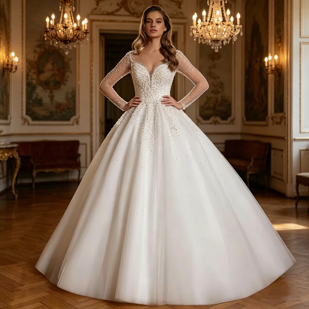 Luxury Ball Gown Wedding Dress Customized Sheer Long Sleeves Round Neck Beading Pearls Sweep Train Tulle Bridal Dresses