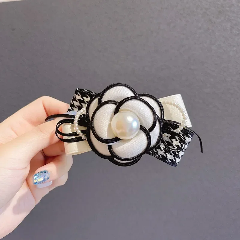 Klasyczna spinka do włosów w kształcie kwiatu kamelii dla kobiet kokarda w kształcie Houndstooth klips sprężynowy kucyk perłowe spinki do włosów koreańskie akcesoria do włosów nakrycia głowy