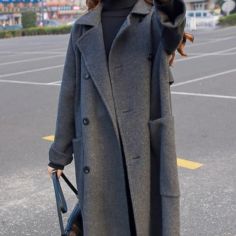 Um casaco de lã de comprimento médio para mulher 2026 outono/inverno novo estilo hepburn popular solto na altura do joelho cinza engrossado jaqueta de lã