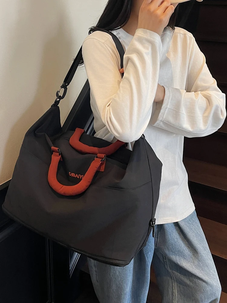 new-large-capacity-travel-bag-unisex-lightweight-casual-fitness-handheld-bag-black-leisure-travel-backpack-for-short-trips