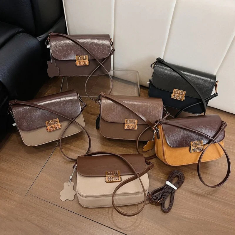 

Luxury Women's Shoulder Bag Made Of Faux Leather Featuring Trendy Commuter Design And Paris Casual Vintage Style​