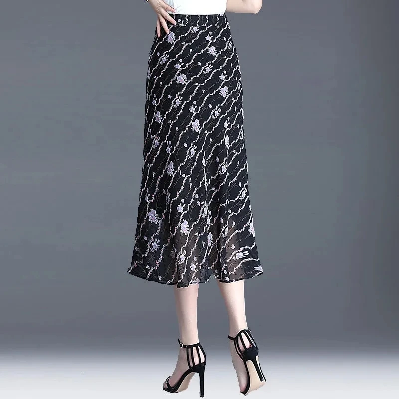 Printemps été nouvelle jupe Midi en mousseline de soie femmes taille haute a-ligne enveloppé jupes de hanche mode mince longues motifs floraux jupes 4XL