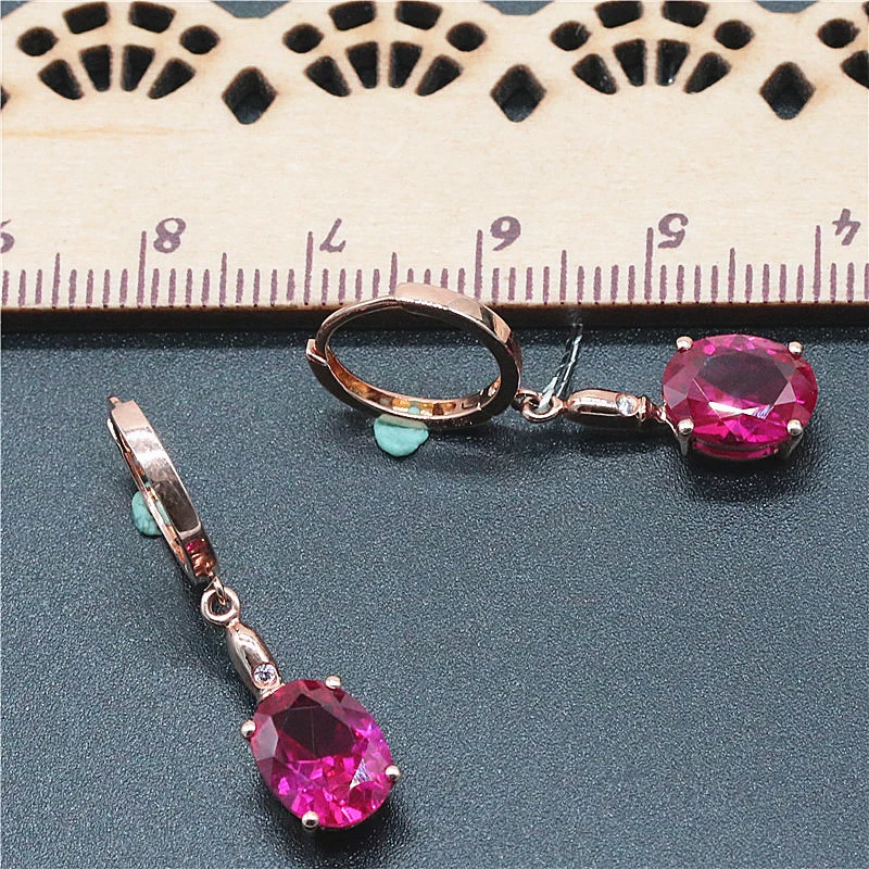 585 الأرجواني مطلية بالذهب 14K ارتفع الذهب مطعمة روبي البيضاوي أقراط للنساء الكلاسيكية سلسلة ضوء فاخر موضة مجوهرات الزفاف