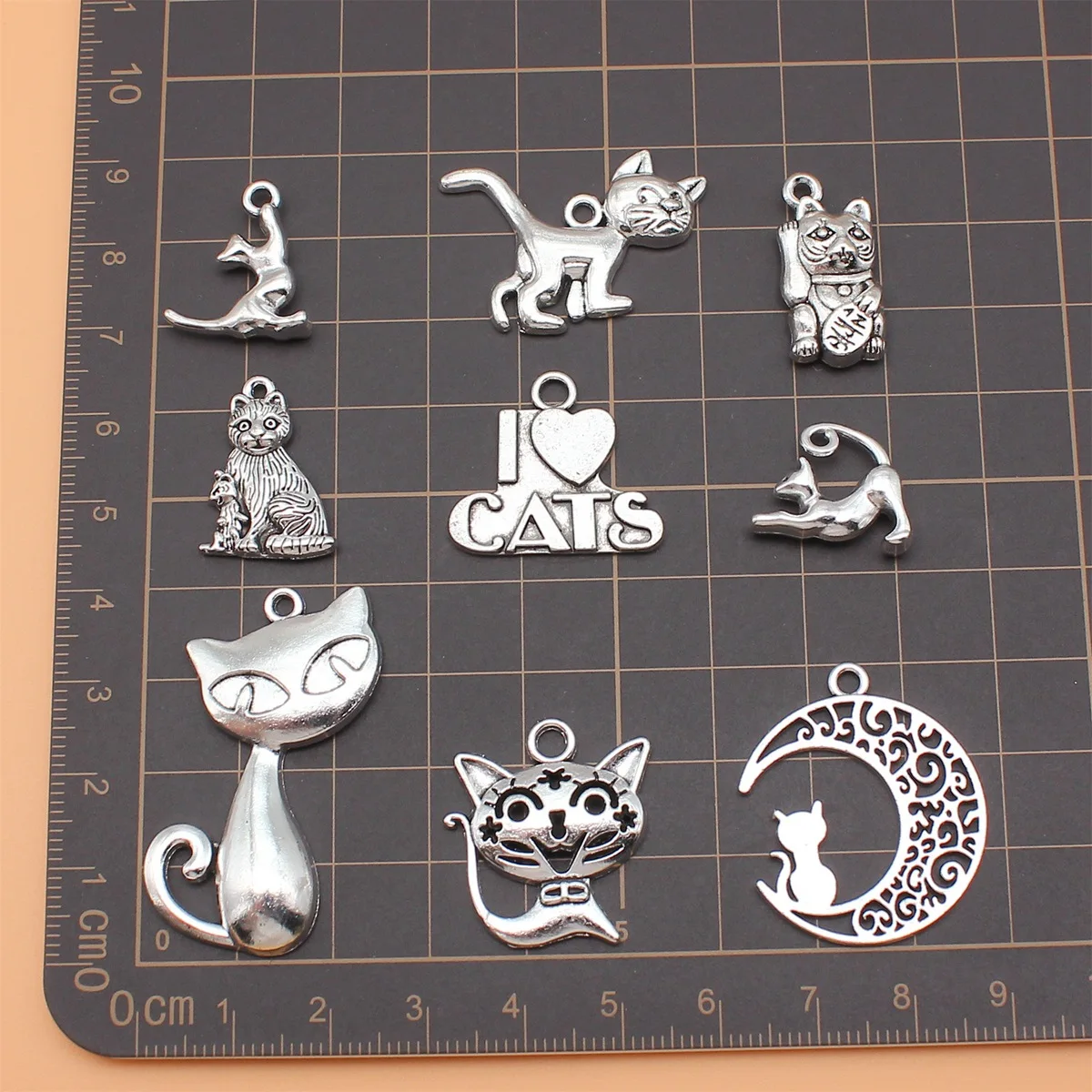 100 sztuk/worek 9 stylów antyczne srebro kolor kot Charms wisiorek Diy biżuteria akcesoria do tworzenia biżuterii