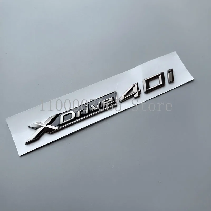 New Gun Grey ABS Car Emblem Sticker Xdrive 20i 25i 30i 35i 40i 45i 50i for X3 X4 X7 Car Trunk Side Doors Nameplate Logo Badge