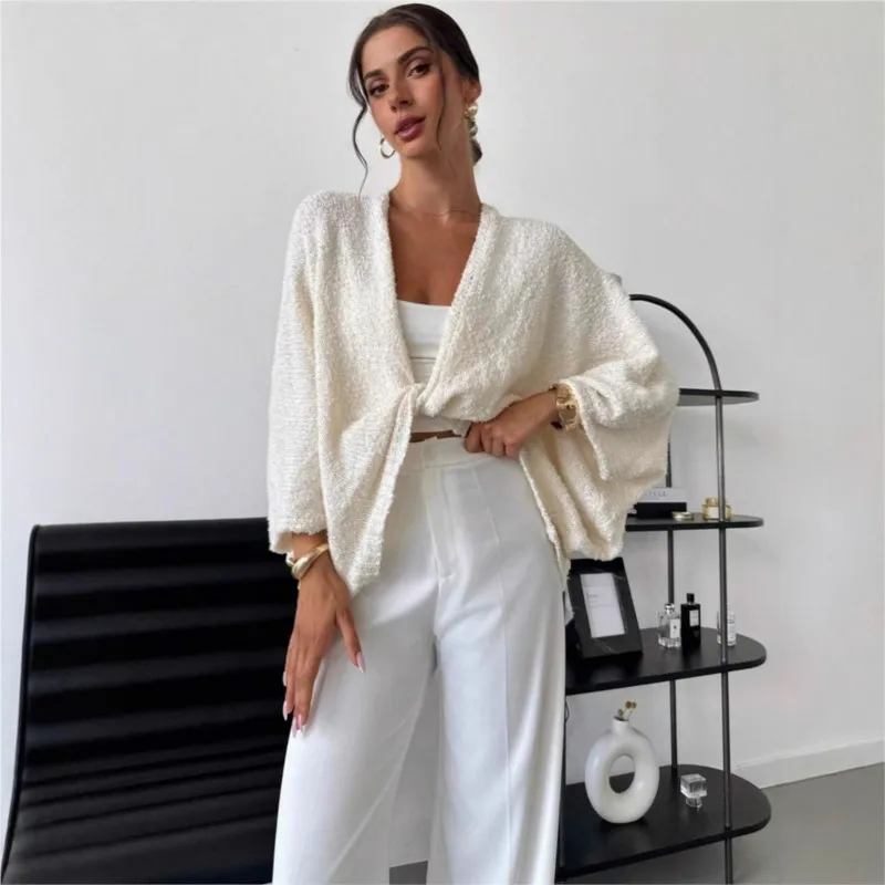 

Fashionable deep V-neck Cross-over Design twisted long sleeved loose solid top for autumn winter women's casual and elegant top