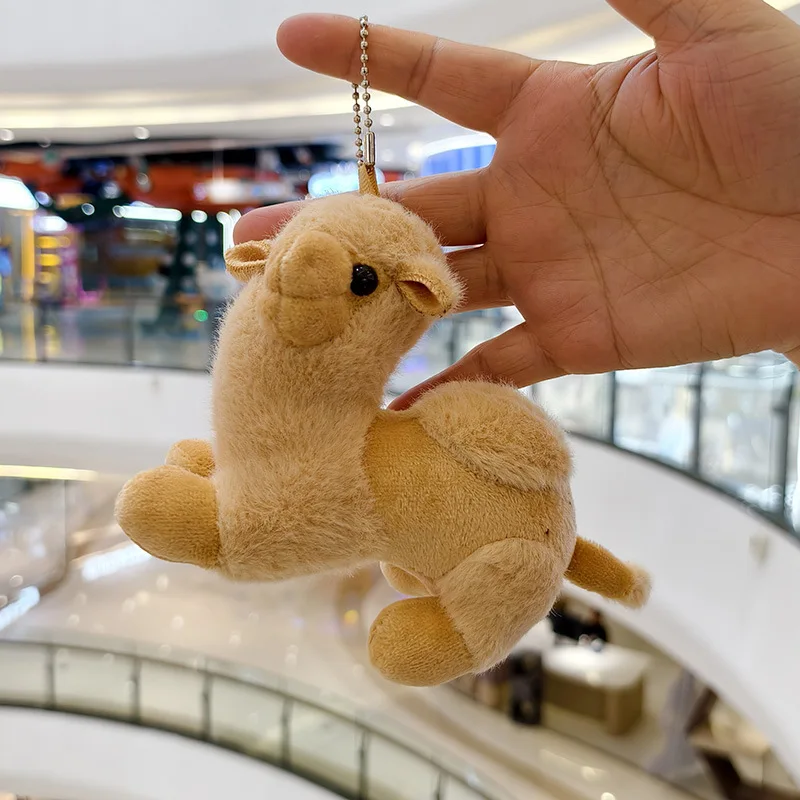 12 سنتيمتر الكرتون الجمل دمية ألعاب من نسيج مخملي المفاتيح المدرسية دمية قلادة حقيبة سيارة حلقة رئيسية سحر لينة محشوة ألعاب حيوانات الهدايا الإبداعية