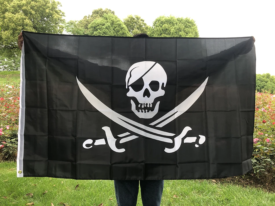Bandera pirata Jolly Roger con cráneo doble y cuchillo