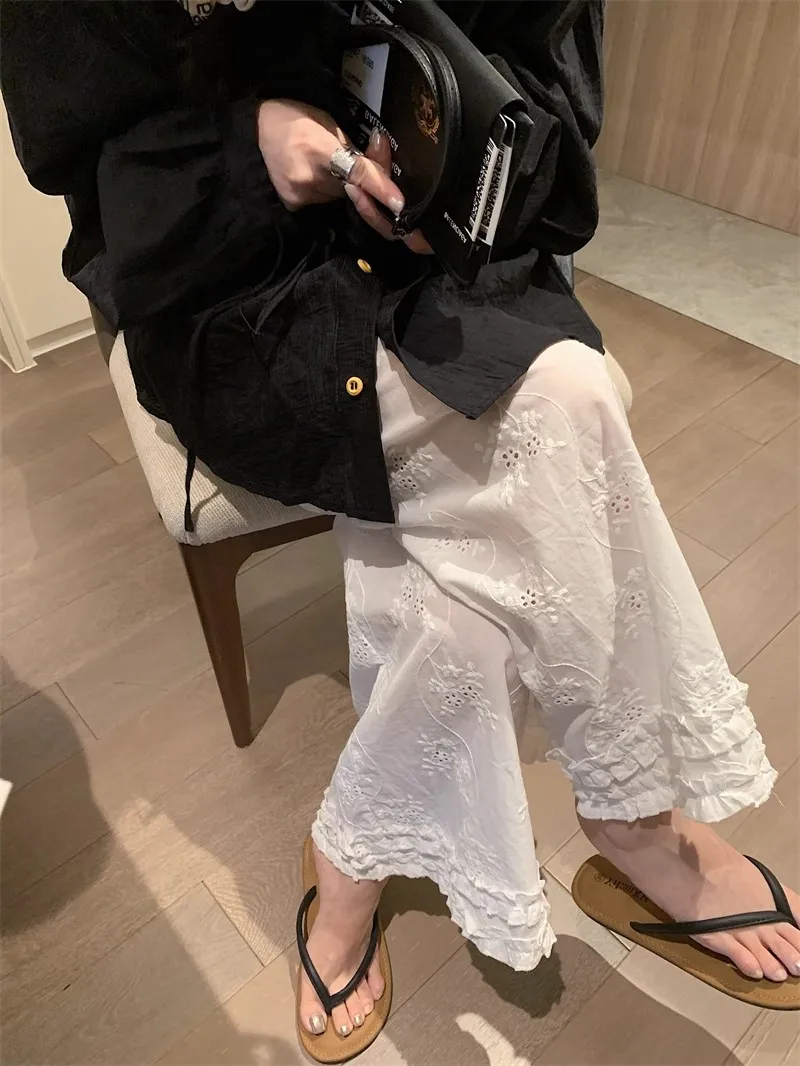 Białe koronkowe spodnie z szerokimi nogawkami, elastyczną talią, luźne, codzienne, o prostym kroju, letnie, nowe, wyszczuplające, damskie, modne.