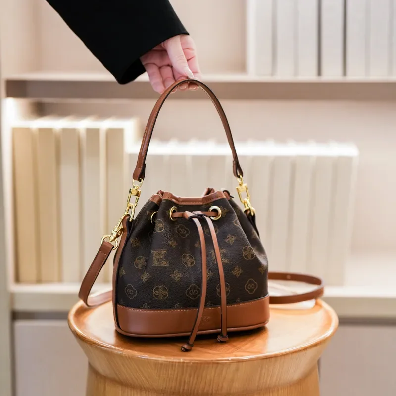 2026 New Vintage Monogram Drawstring Bucket Versatile Fashionable Women's Handbag Color-Block Commuting Shoulder Crossbody Bag