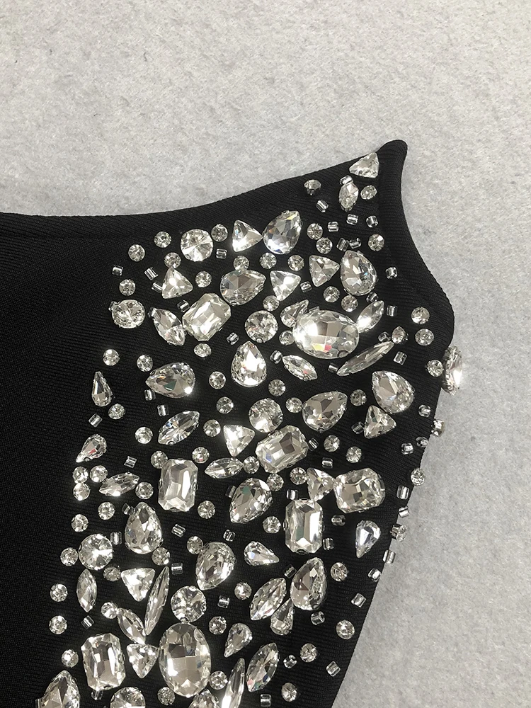 Abito sexy dalla fasciatura con perline di cristallo scintillante senza spalline da donna Mini abiti aderenti con diamanti neri senza maniche Celebrity Cocktail