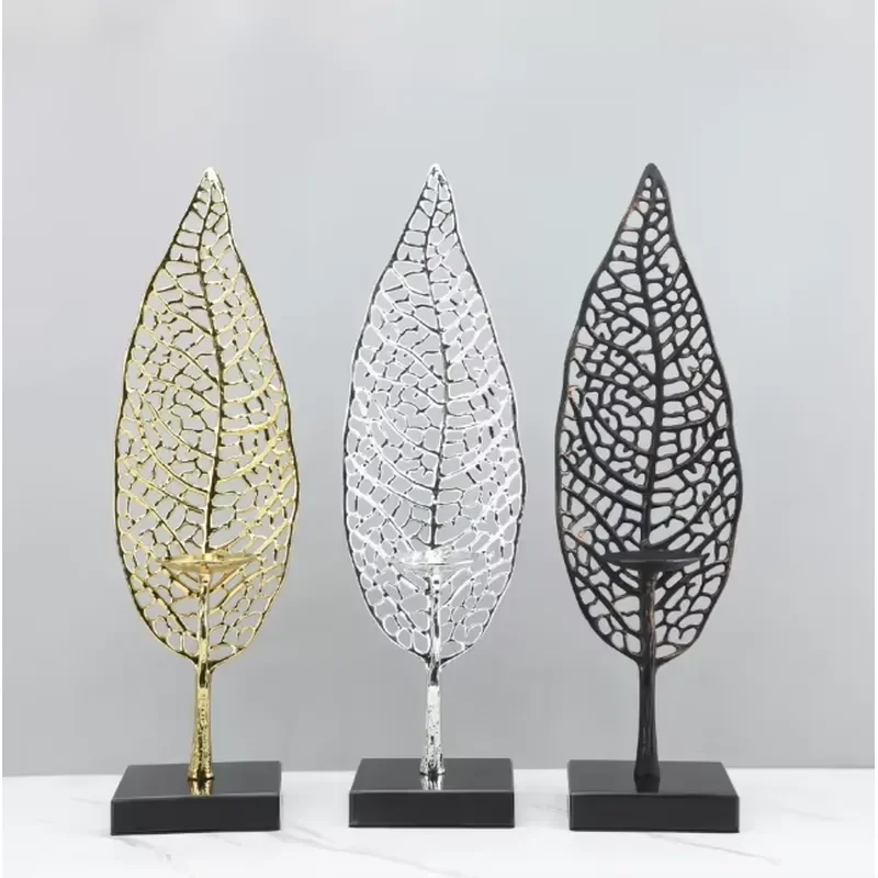 Hollow metal leaf candle holder