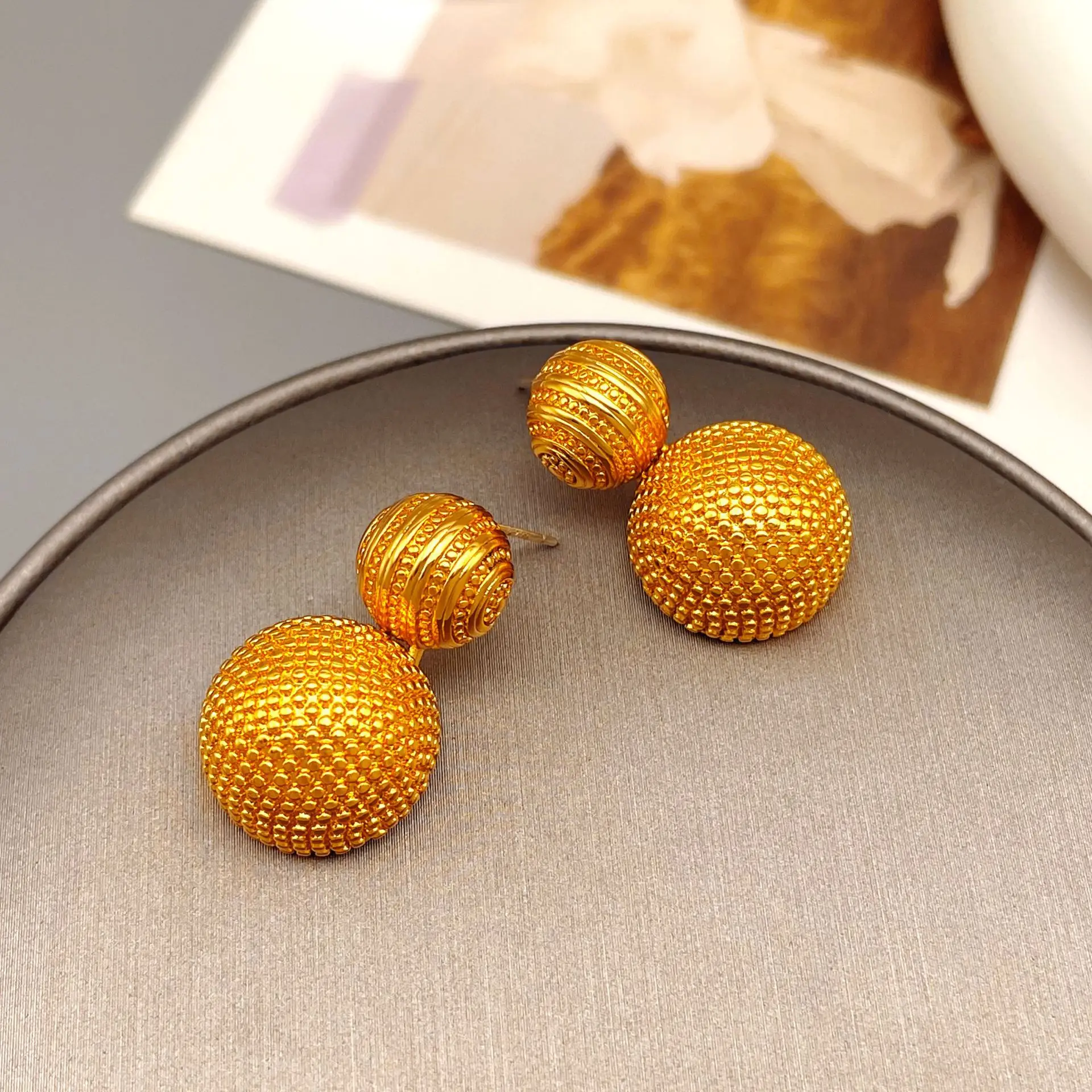 

European and American new retro style hemisphere polka dot carving texture personalized fashion stud earrings jewelry