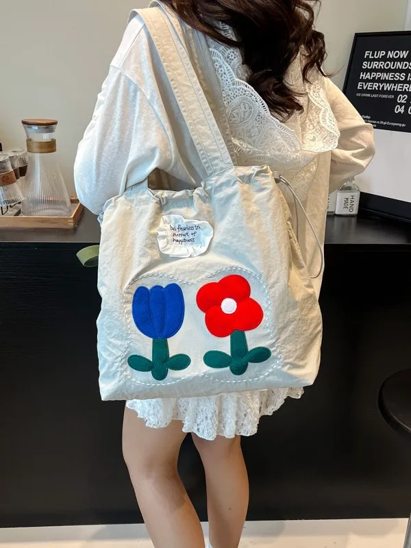2025 nuevo bolso de hombro de flores de verano de gran capacidad Edición coreana lindo bolso de mano de ocio bolso de compras de gran capacidad bolso de lona