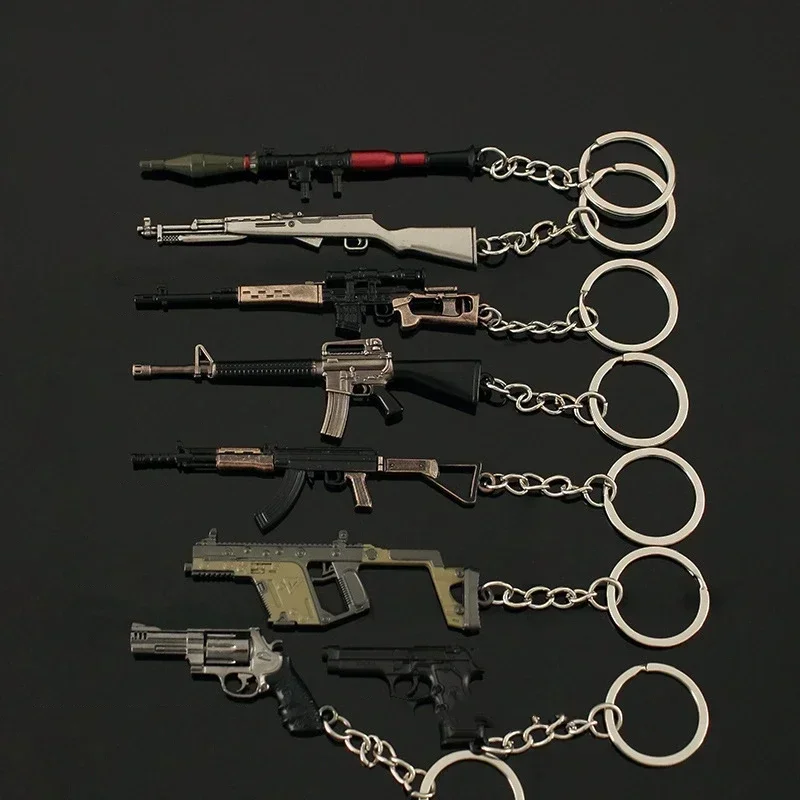 Nova arma de metal chaveiro pubg ak 47 mini glok arma modelo liga pistola luz chaveiro pingente presente brinquedo coleção