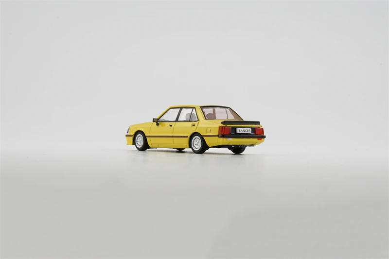 BMC 1:64 Lancer EX2000 Turbo Yellow LHD Diecast Model Car