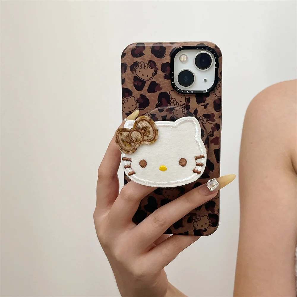 Nuevo cordón de lujo con soporte HelloKitty con estampado de leopardo, adecuado para iPhone 17 12, 13, 14, 15, 16 Pro Max anticaída todo incluido