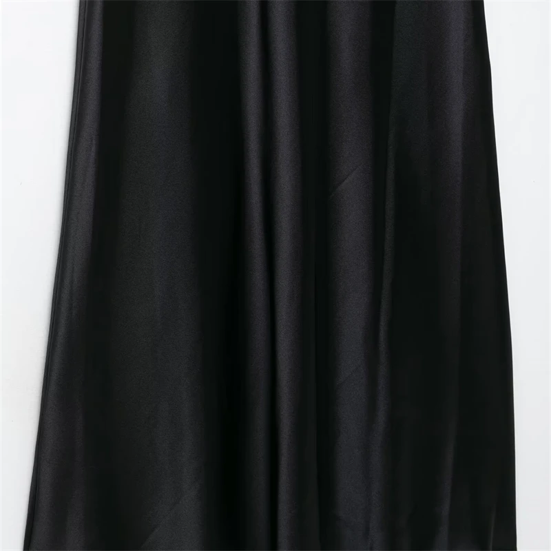 KEYANKETIAN 2025 nouvelles femmes soie Satin texturé Spaghetti sangle licou robe mode simplement mince noir une ligne robes MIDI