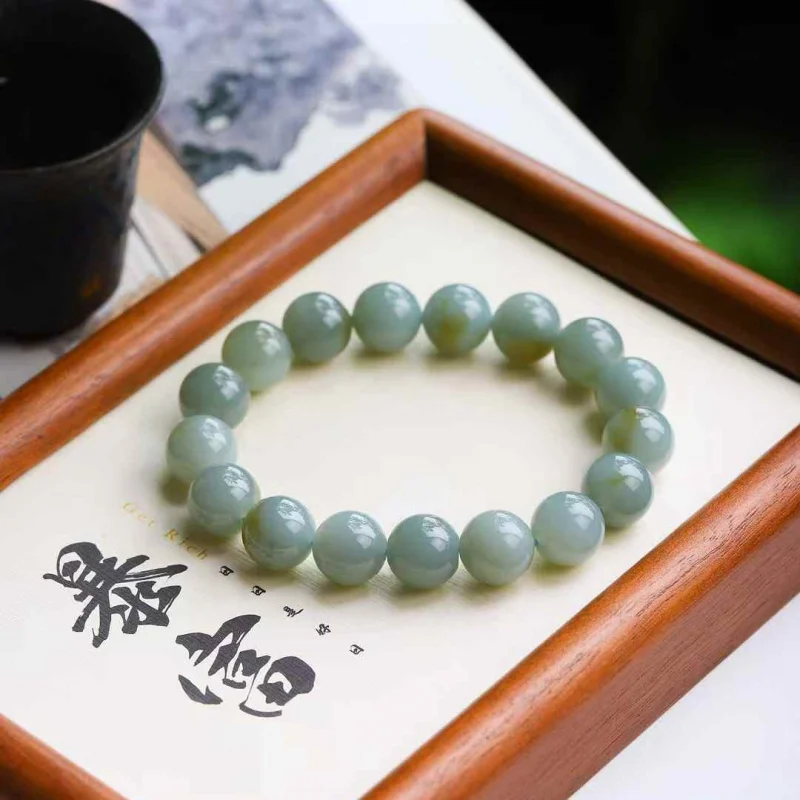 

Natural Hetian Jade Qie Mo Old Material Floating Sugar Color Round Bead Bracelet Men And Women