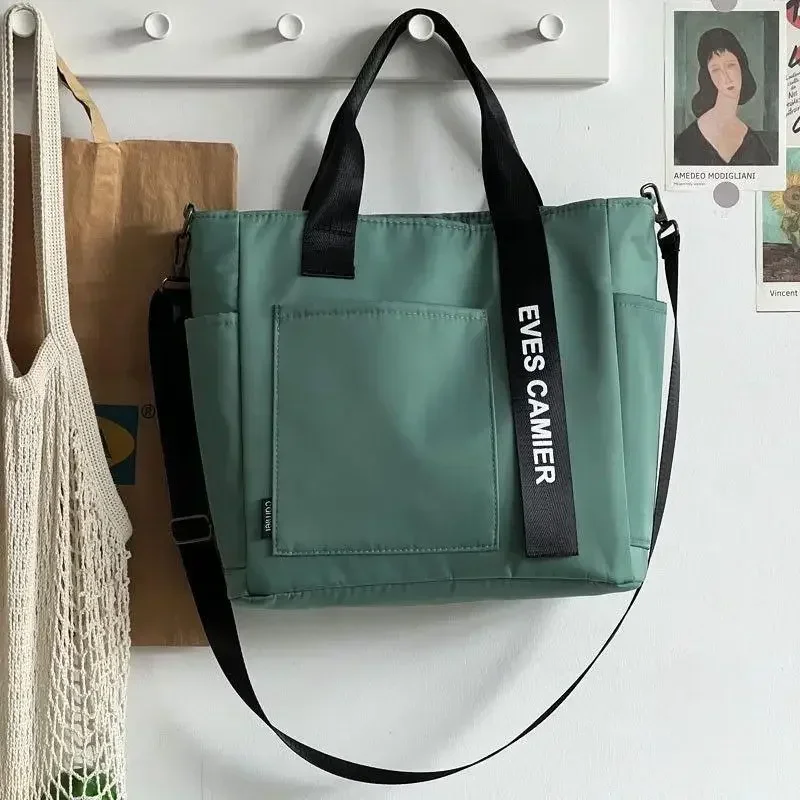 Nieuwe Casual Tote Schoudertas met grote capaciteit Nylon Waterdichte canvas handtas Eenvoudige mode Messenger Bags voor schoolmeisje