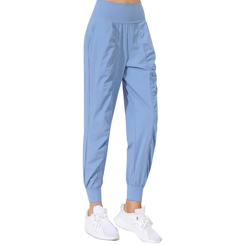 Pantaloni da Yoga pantaloni da Yoga larghi Slim ad asciugatura rapida orlo pieghettato rilegato Running Fitness Capris