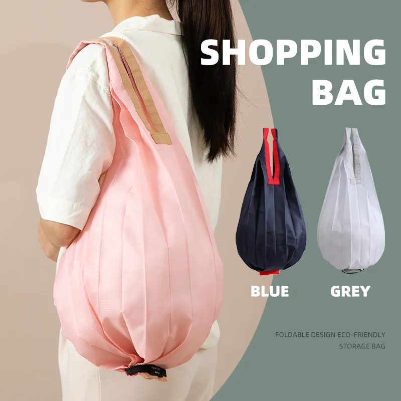 Folding eco-friendly shopping bag with accordion pleats, large capacity, ultra lightweight, portable, hanging buckle for travel