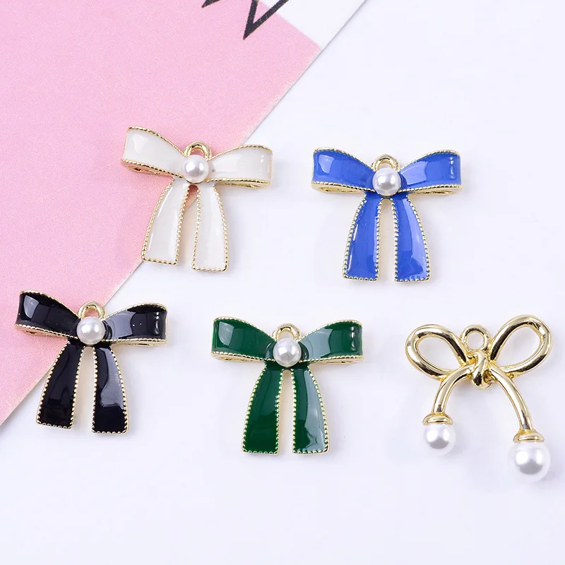 

100 pieces set Korean simple temperament earrings stud earrings DIY retro French bow pendant spot wholesale