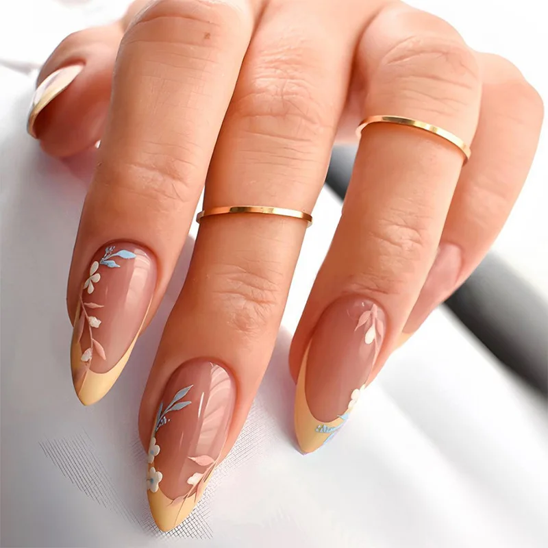 

24Pcs Mid-length French Almond Fake Nail White Round Head Press on False Nails with Flower Pattern Wearable Full Cover Nail Tips