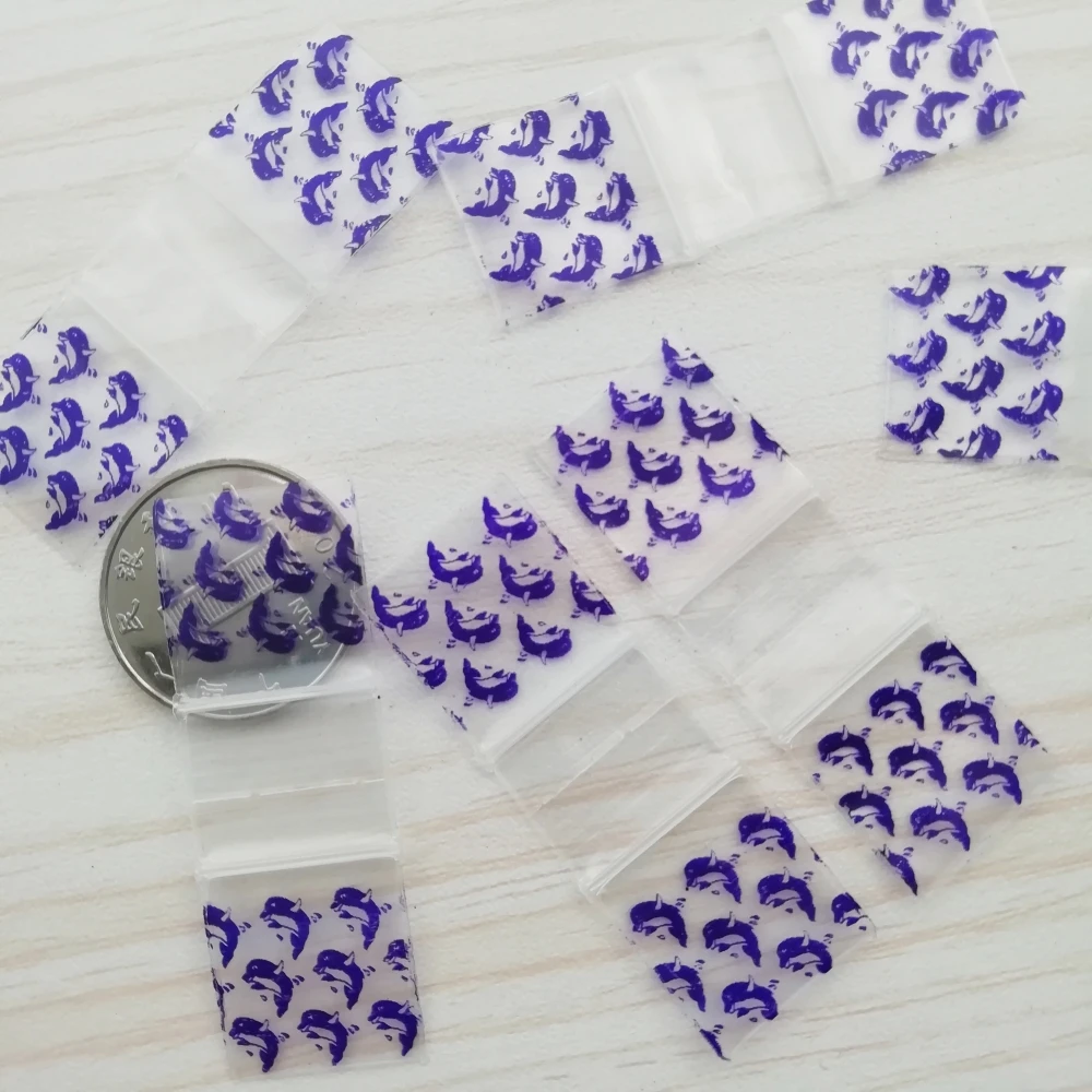 3434 Little Reclosed Zipper Baggies 100pcs Purple Dolphin Design Print Self Seal Zip Seal Bags Small Size 2x2cm