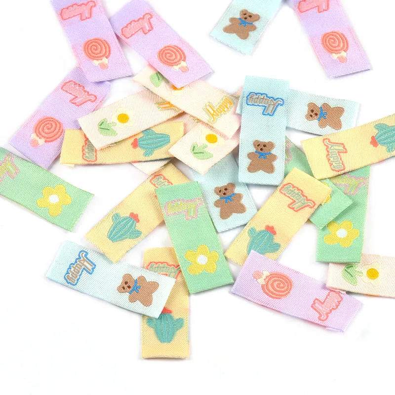 50pcs 39x15mm Cute Bear/Flower/Cactus/Lollipop Mixed Embroidered Labels Washable Tags For Clothes Sewing Accessories Decor c3742