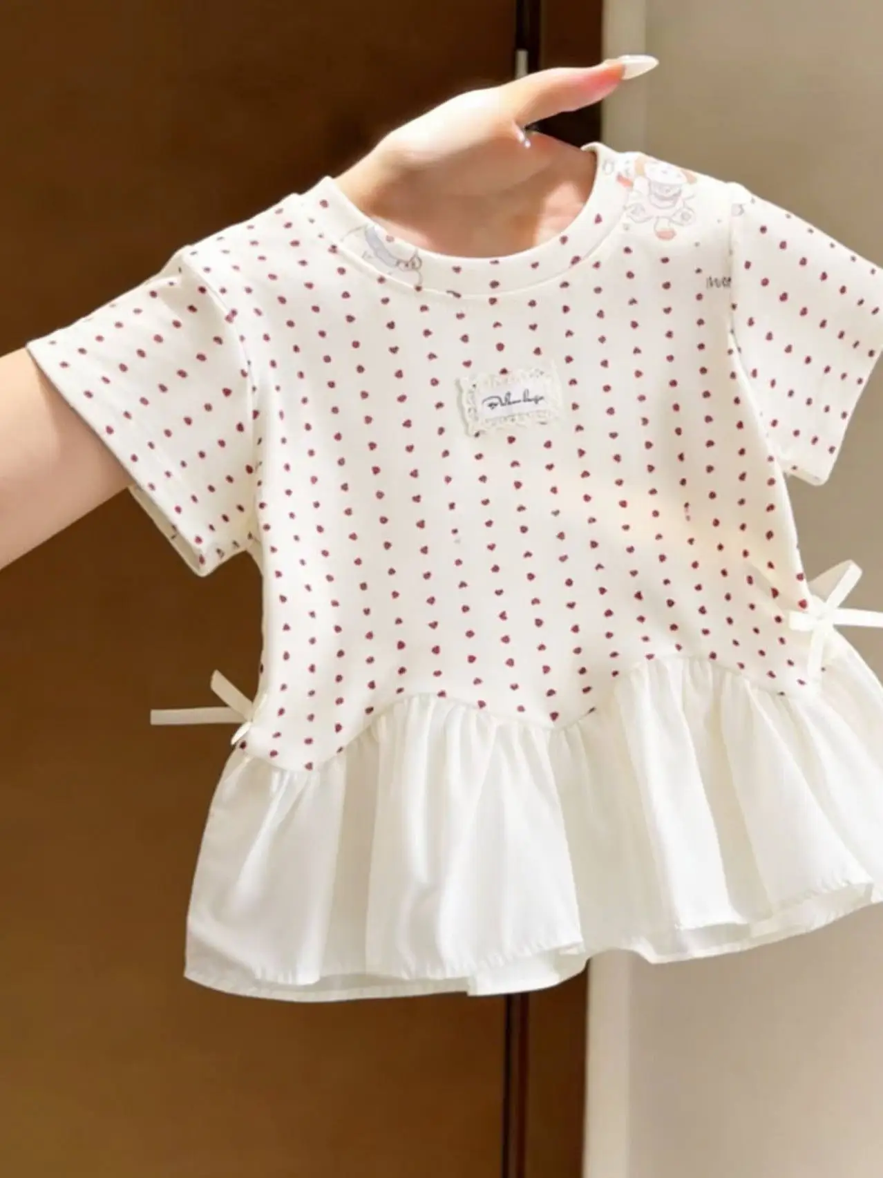 Girls' 2026 summer Korean round neck short sleeved polka dot print ruffle edge butterfly bow stylish versatile top