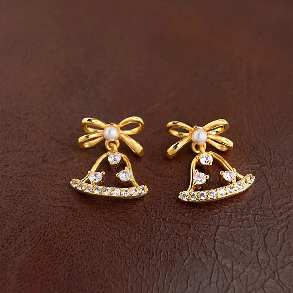 

Trendy Christmas Bowknot Earrings Zircon Hollow-out Bell Light Luxury Niche Ear Pins & Clip-on Styles