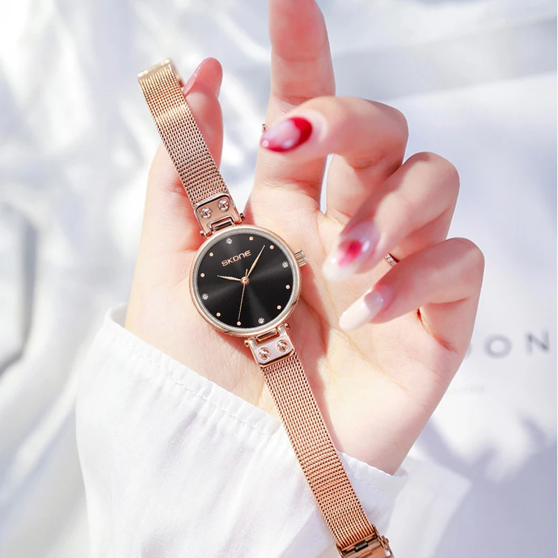 SKONE นาฬิกาผู้หญิง สไตล์เกาหลี Ins แฟชั่น เบา หรูหรา อินเทรนด์ นักเรียน นาฬิกาสายตาข่ายเหล็กอารมณ์เรียบง่าย