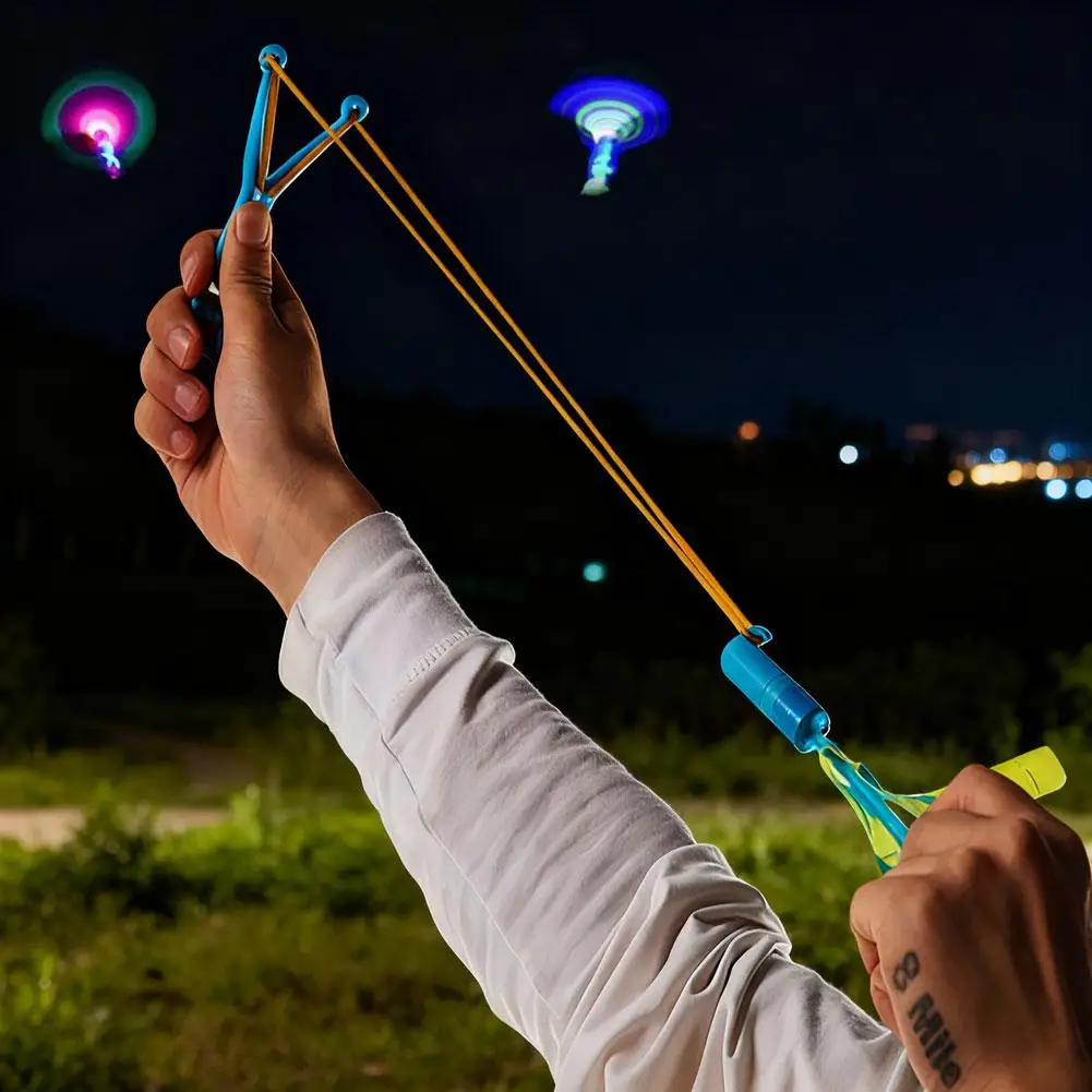 LED Light-Up Propeller Flying Toy Slingshot Launcher Whistling Helicopter Glow In Dark Outdoor Fun Gift For Kids