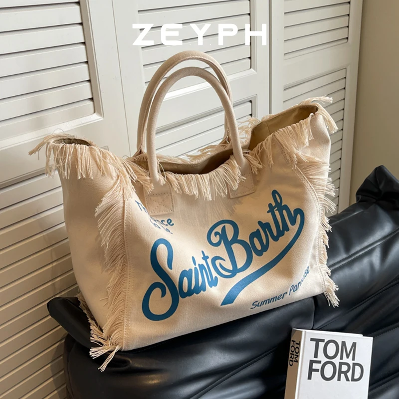 

Zeyph Saint Barth European and American New Women's Large Capacity Casual Beach Canvas Striped Tassel Handheld Tote Bag