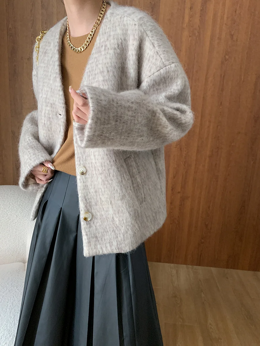 Autumn and winter women\'s casual solid color V-neck long sleeved loose coat